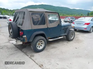 1995 Jeep Wrangler S z VIN 1J4FY19P1SP249453, wystawiony jako IAAI lot #42379722 z przebiegiem 160 066 mil mil oraz . Historia ofert i sprzedaży dostępna na DreamBid. Obrazek 4.