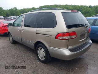 2001 Toyota Sienna LE with VIN 4T3ZF13CX1U367504, listed as a IAAI auction lot 42111583 with 302,801 mi miles and . Bid and sale history available at DreamBid. Image 3.