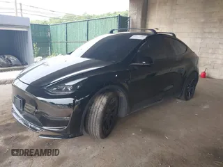 2023 Tesla Model Y Long Range with VIN 7SAYGDEE3PA185778, listed as a IAAI auction lot 39721611 with 11,986 mi miles and . Bid and sale history available at DreamBid. Image 17.