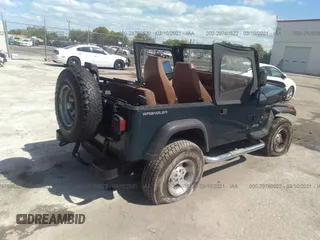 1995 Jeep Wrangler S with VIN 1J4FY19P4SP207049, listed as a IAAI auction lot 41315322 with 12,454 mi miles. Bid and sale history available at carsss.com. Image 4.