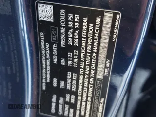 2021 Aston Martin DBX z VIN SCFVUJAW9MTV02708, wystawiony jako Copart lot #85731374 z przebiegiem Nie podano mil oraz Szkoda całkowita • Salvage title. Historia ofert i sprzedaży dostępna na DreamBid. Obrazek 13.