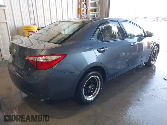 2016 Toyota Corolla L with VIN 5YFBURHE1GP482365, listed as a IAAI auction lot 41902840 with 124,165 mi miles and . Bid and sale history available at DreamBid. Image 4.