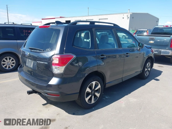 2018 Subaru Forester z VIN JF2SJABC1JH460419, wystawiony jako IAAI lot #42292895 z przebiegiem 141 486 mil mil oraz . Historia ofert i sprzedaży dostępna na DreamBid. Obrazek 4.