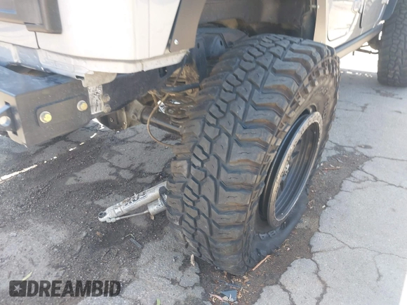 2018 Jeep Wrangler Unlimited Sport with VIN 1C4BJWDG4JL807265, listed as a IAAI auction lot 42520648 with 69,229 mi miles and . Bid and sale history available at DreamBid. Image 18.
