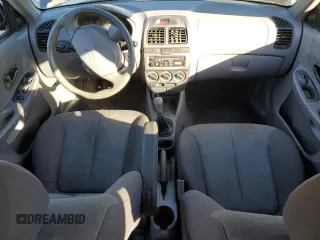 2005 Hyundai Accent GLS with VIN KMHCG45C15U662362, listed as a Copart auction lot 80574774 with 122,898 mi miles and Salvage Title. Bid and sale history available at carsss.com. Image 8.