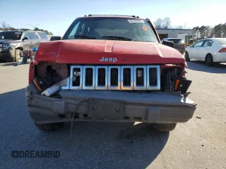 1994 Jeep Grand Cherokee Laredo with VIN 1J4GZ58S8RC254097, listed as a Copart auction lot 47379645 with 240,739 mi miles and Salvage Title. Bid and sale history available at carsss.com. Image 5.