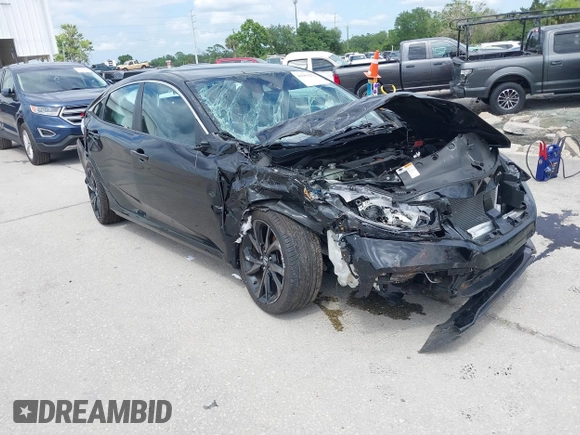 2019 Honda Civic Sport with VIN 19XFC2F85KE015159, listed as a IAAI auction lot 41993276 with 82,542 mi miles and . Bid and sale history available at DreamBid. Image 1.