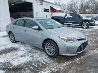 2016 Toyota Avalon Hybrid XLE Premium with VIN 4T1BD1EBXGU051548, listed as a IAAI auction lot 41353975 with 30,102 mi miles. Bid and sale history available at carsss.com. Image 1.
