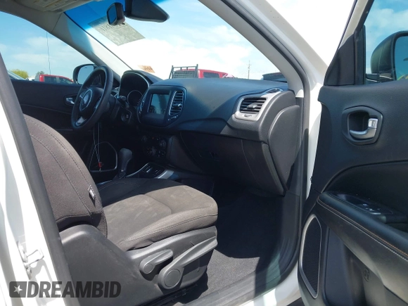 2020 Jeep Compass Sport with VIN 3C4NJCAB5LT253133, listed as a IAAI auction lot 42181816 with 76,255 mi miles and . Bid and sale history available at DreamBid. Image 5.