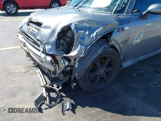 2005 MINI Convertible S with VIN WMWRH33545TF85051, listed as a IAAI auction lot 41843147 with 109,656 mi miles and . Bid and sale history available at DreamBid. Image 13.