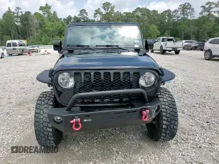 2023 Jeep Gladiator Sport S with VIN 1C6HJTAG9PL525183, listed as a Copart auction lot 54556735 with 13,805 mi miles and Salvage title. Bid and sale history available at DreamBid. Image 13.