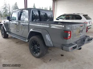 2022 Jeep Gladiator Overland with VIN 1C6HJTFG2NL114648, listed as a IAAI auction lot 41710064 with 62,453 mi miles. Bid and sale history available at carsss.com. Image 3.