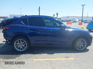 2019 Alfa Romeo Stelvio z VIN ZASPAKAN5K7C29955, wystawiony jako IAAI lot #42096049 z przebiegiem 85 935 mil mil oraz . Historia ofert i sprzedaży dostępna na DreamBid. Obrazek 13.