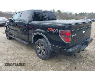 2013 Ford F-150 XL with VIN 1FTFW1ET0DFA97592, listed as a IAAI auction lot 42026885 with 165,091 mi miles. Bid and sale history available at carsss.com. Image 3.