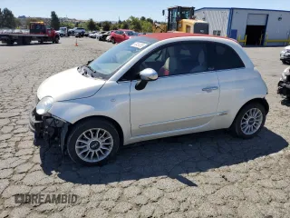 2013 FIAT 500 Lounge with VIN 3C3CFFER9DT744019, listed as a Copart auction lot 63481055 with 49,869 mi miles and Salvage title. Bid and sale history available at DreamBid. Image 1.