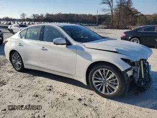 2024 Infiniti Q50 Luxe with VIN JN1EV7BP7RM600453, listed as a Copart auction lot 82838974 with 9,596 mi miles and Salvage title. Bid and sale history available at DreamBid. Image 4.