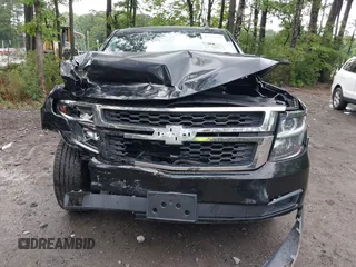 2015 Chevrolet Tahoe LT with VIN 1GNSCBKC9FR600997, listed as a IAAI auction lot 42383789 with 161,151 mi miles and . Bid and sale history available at DreamBid. Image 6.