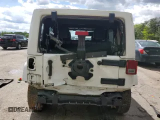 2016 Jeep Wrangler Unlimited Sahara z VIN 1C4HJWEGXGL198684, wystawiony jako Copart lot #49936525 z przebiegiem 158 396 mil mil oraz Szkoda całkowita • Salvage title. Historia ofert i sprzedaży dostępna na DreamBid. Obrazek 6.