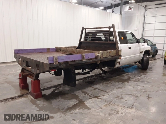 2001 Dodge 2500 z VIN 3B7KF23601G748635, wystawiony jako IAAI lot #41487609 z przebiegiem 310 160 mil mil oraz . Historia ofert i sprzedaży dostępna na DreamBid. Obrazek 4.