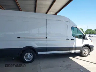 2022 Ford Transit Cargo with VIN 1FTBW3X89NKA69141, listed as a IAAI auction lot 41980864 with 102,721 mi miles and . Bid and sale history available at DreamBid. Image 13.