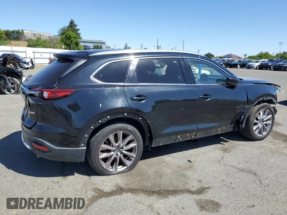 2020 Mazda CX-9 Grand Touring z VIN JM3TCADYXL0414926, wystawiony jako Copart lot #57528945 z przebiegiem 93 768 mil mil oraz Szkoda całkowita • Salvage title. Historia ofert i sprzedaży dostępna na DreamBid. Obrazek 3.