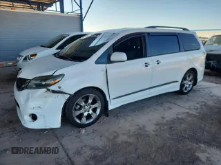 2015 Toyota Sienna SE with VIN 5TDXK3DC4FS556087, listed as a Copart auction lot 60750495 with 168,986 mi miles and Salvage title. Bid and sale history available at DreamBid. Image 1.