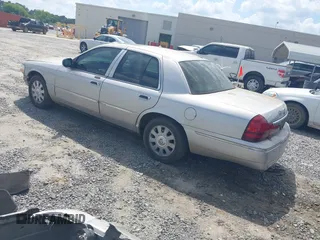 2004 Mercury Grand Marquis LS Premium z VIN 2MHFM75W84X658355, wystawiony jako IAAI lot #42166597 z przebiegiem 214 858 mil mil oraz . Historia ofert i sprzedaży dostępna na DreamBid. Obrazek 3.