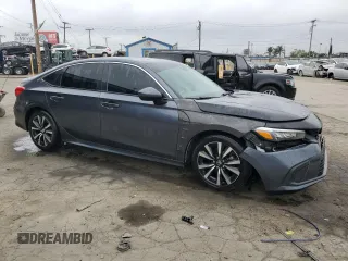 2023 Honda Civic EX z VIN 2HGFE1F72PH312995, wystawiony jako Copart lot #57284305 z przebiegiem 7 921 mil mil oraz Szkoda całkowita • Salvage title. Historia ofert i sprzedaży dostępna na DreamBid. Obrazek 4.