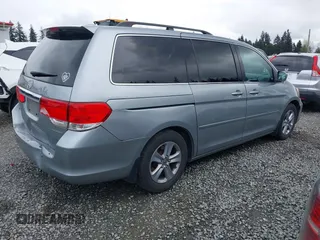 2008 Honda Odyssey Touring with VIN 5FNRL38908B098771, listed as a IAAI auction lot 41878646 with 167,834 mi miles. Bid and sale history available at carsss.com. Image 4.