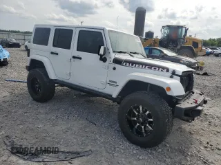2017 Jeep Wrangler Unlimited Rubicon Recon with VIN 1C4BJWFG7HL696895, listed as a Copart auction lot 57409625 with 50,802 mi miles and Salvage title. Bid and sale history available at DreamBid. Image 4.