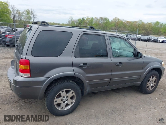 2005 Ford Escape Limited with VIN 1FMYU94155KB76337, listed as a IAAI auction lot 42006729 with 170,526 mi miles. Bid and sale history available at carsss.com. Image 13.
