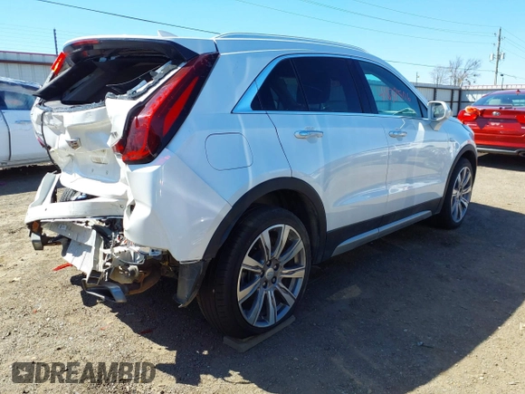 2020 Cadillac XT4 FWD Premium Luxury with VIN 1GYFZCR41LF115094, listed as a IAAI auction lot 41838506 with 70,153 mi miles and . Bid and sale history available at carsss.com. Image 4.
