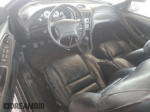 1996 Ford Mustang Cobra with VIN 1FALP46V0TF188786, listed as a Copart auction lot 57933355 with 36,931 mi miles and Salvage title. Bid and sale history available at DreamBid. Image 8.