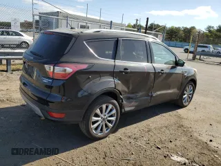 2017 Ford Escape Titanium with VIN 1FMCU9JD3HUD63223, listed as a Copart auction lot 53370004 with 128,666 mi miles and Non Repairable. Bid and sale history available at carsss.com. Image 3.