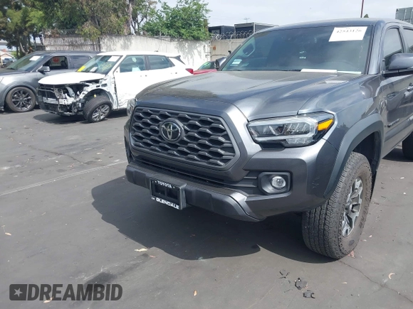 2023 Toyota Tacoma SR with VIN 3TMCZ5AN0PM635933, listed as a IAAI auction lot 42543126 with 32,960 mi miles and . Bid and sale history available at DreamBid. Image 13.