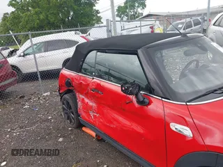 2019 MINI Convertible Cooper S с VIN WMWWG9C51K3E39565, выставлен на аукционе IAAI как лот 42125546 с пробегом 58 634 миль миль и . История ставок и продаж доступна на DreamBid. Изображение 6.