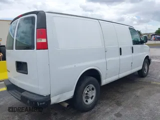 2014 Chevrolet Express Cargo Van with VIN 1GCWGFFA2E1111014, listed as a IAAI auction lot 42190194 with 97,172 mi miles. Bid and sale history available at carsss.com. Image 4.