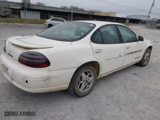 2003 Pontiac Grand Prix SE with VIN 1G2WK52J43F147659, listed as a IAAI auction lot 41194638 with 1 mi miles. Bid and sale history available at carsss.com. Image 4.