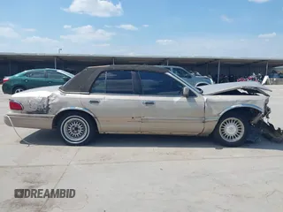 1997 Mercury Grand Marquis LS with VIN 2MELM75W3VX707138, listed as a IAAI auction lot 40055743 with 198,489 mi miles and . Bid and sale history available at DreamBid. Image 14.