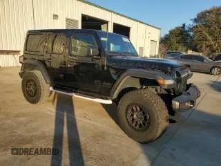 2022 Jeep Wrangler Unlimited High Tide with VIN 1C4HJXDG0NW247152, listed as a Copart auction lot 82371674 with 32,417 mi miles and Salvage Title. Bid and sale history available at DreamBid. Image 4.