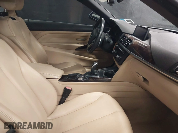 2015 BMW 4 Series 428i xDrive with VIN WBA3T1C52FP821020, listed as a IAAI auction lot 42004707 with 74,951 mi miles and . Bid and sale history available at carsss.com. Image 5.