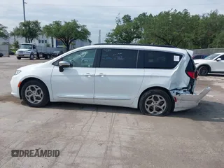 2023 Chrysler Pacifica Limited with VIN 2C4RC1GG7PR566163, listed as a IAAI auction lot 42393988 with 59,354 mi miles and . Bid and sale history available at DreamBid. Image 14.