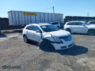 2014 Cadillac SRX Luxury Collection with VIN 3GYFNEE3XES577057, listed as a IAAI auction lot 41751857 with 135,881 mi miles. Bid and sale history available at carsss.com. Image 1.