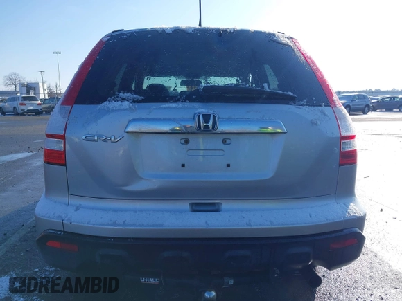 2009 Honda CR-V EX with VIN 3CZRE38589G704086, listed as a IAAI auction lot 41348951 with 128,784 mi miles and . Bid and sale history available at carsss.com. Image 16.