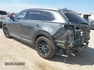 2016 Mazda CX-9 Grand Touring with VIN JM3TCADY5G0120033, listed as a IAAI auction lot 42248488 with 150,044 mi miles and . Bid and sale history available at DreamBid. Image 3.