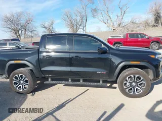 2024 GMC Canyon 4WD AT4 with VIN 1GTP6DEK9R1118926, listed as a IAAI auction lot 40998280 with 10,958 mi miles. Bid and sale history available at carsss.com. Image 13.