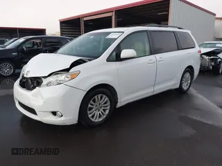 2014 Toyota Sienna XLE with VIN 5TDYK3DC1ES429932, listed as a IAAI auction lot 41692134 with 93,625 mi miles. Bid and sale history available at carsss.com. Image 2.