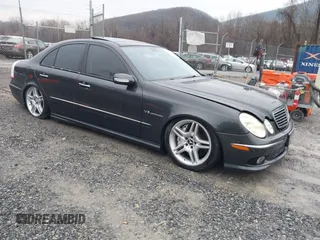 2003 Mercedes-Benz E-Class 5.5L AMG with VIN WDBUF76JX3A267197, listed as a IAAI auction lot 41485778 with 89,310 mi miles. Bid and sale history available at carsss.com. Image 1.