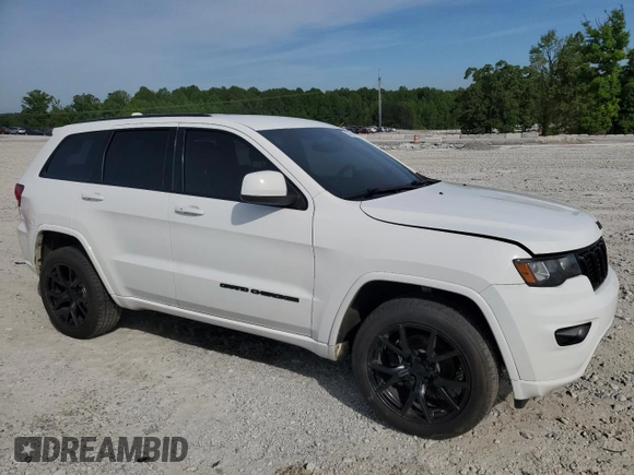 2018 Jeep Grand Cherokee Laredo E with VIN 1C4RJFAG3JC214922, listed as a Copart auction lot 56583955 with 133,643 mi miles and Clean Title. Bid and sale history available at DreamBid. Image 4.