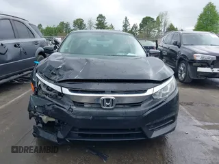 2016 Honda Civic EX with VIN 19XFC2F79GE023053, listed as a IAAI auction lot 41961571 with 136,054 mi miles and . Bid and sale history available at DreamBid. Image 13.